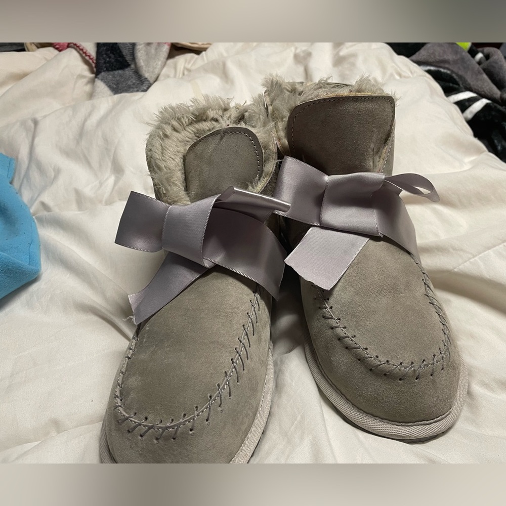 Ugg slipper moccasin. Worn once in the house to try on